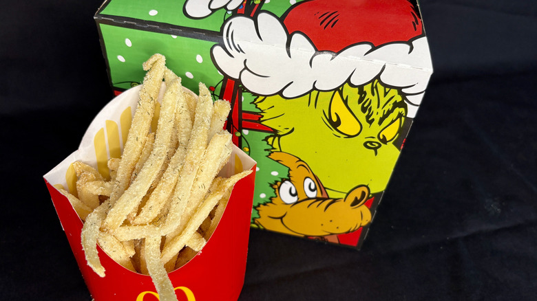 McDonald's Grinch fries next to Grinch box