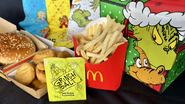 Grinch McDonald's fries with food in background