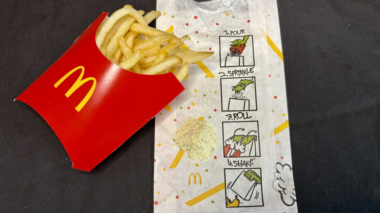 McDonald's fries on shaker bag with Grinch Salt seasoning