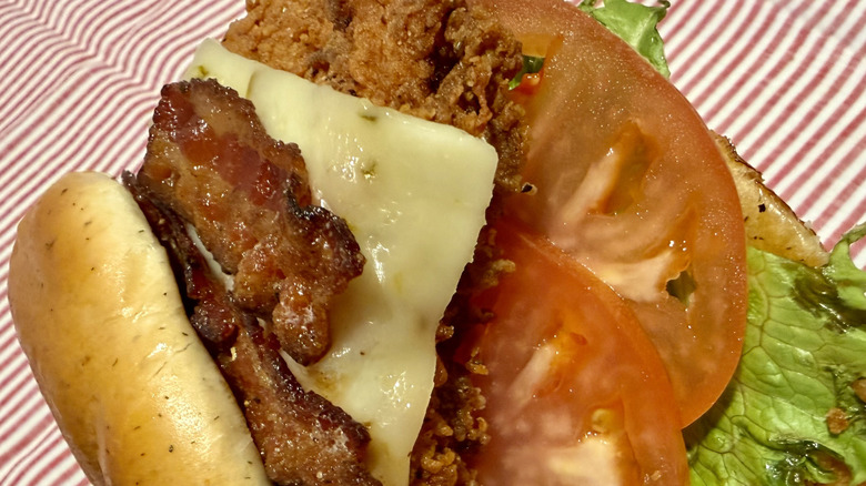 A close-up view of the ingredients in a new Jalapeno Ranch Club Chicken Sandwich