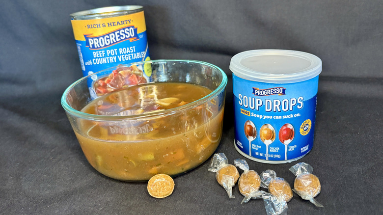 Bowl of soup with Progresso cans and soup drops