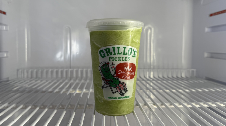Smoothie King x Grillo's Pickles Smoothie in a plastic to-go cup in a fridge