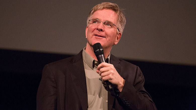 Rick Steves speaking at event.
