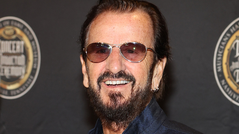 Ringo Starr smiling with open mouth