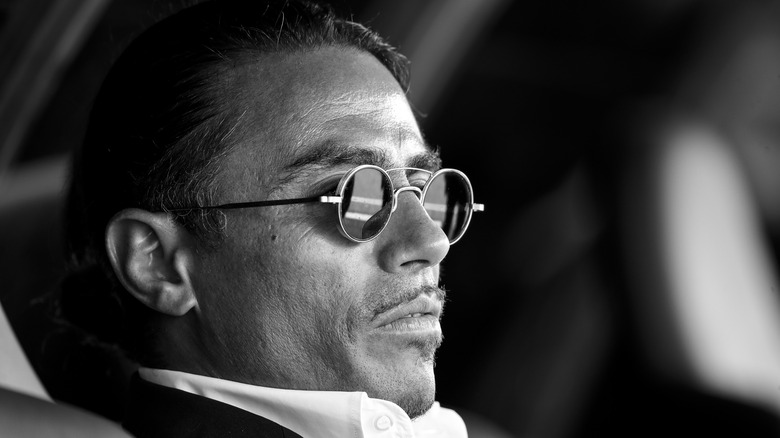 A black-and-white photo of Nusret Gökçe, also known as Salt Bae,