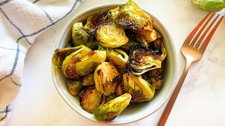 brussels sprouts in bowl with fork
