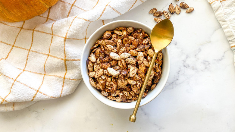 roasted pumpkin seeds in bowl 