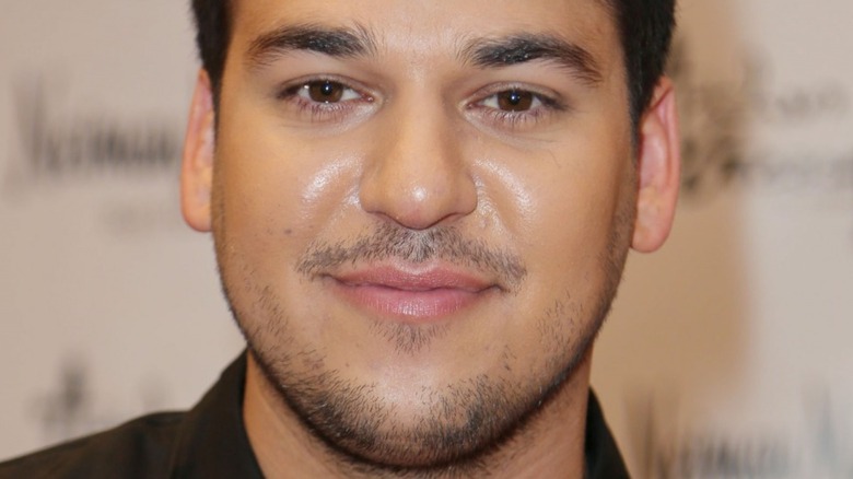 Rob Kardashian with slight smile