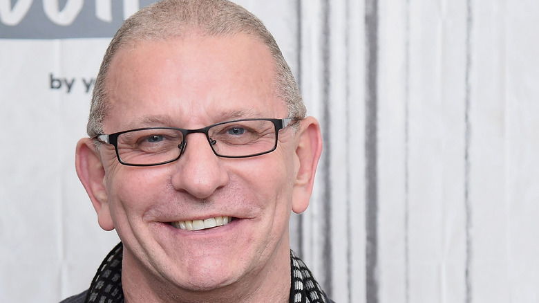 Robert Irvine smiles to the camera