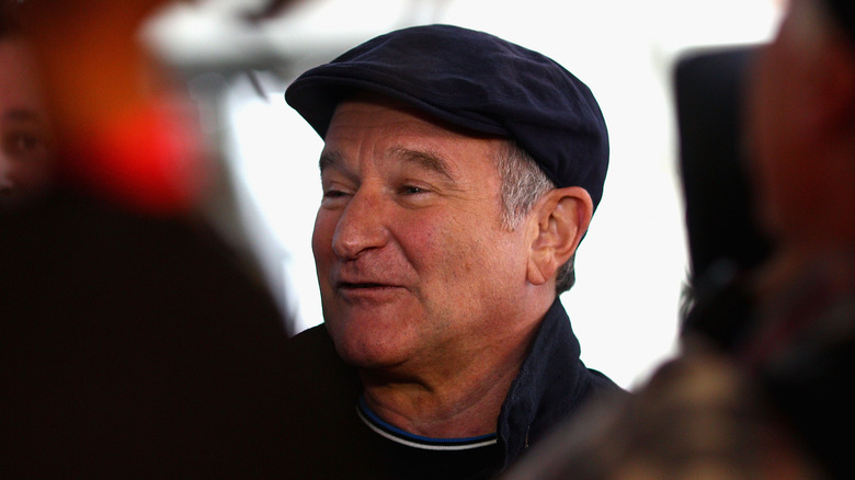 Robin Williams wearing hat