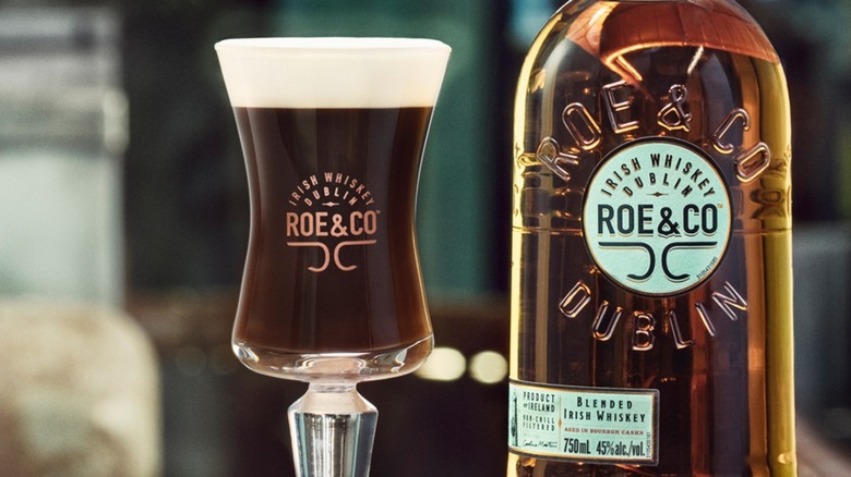 Roe and Co bottle of irish whiskey and beer