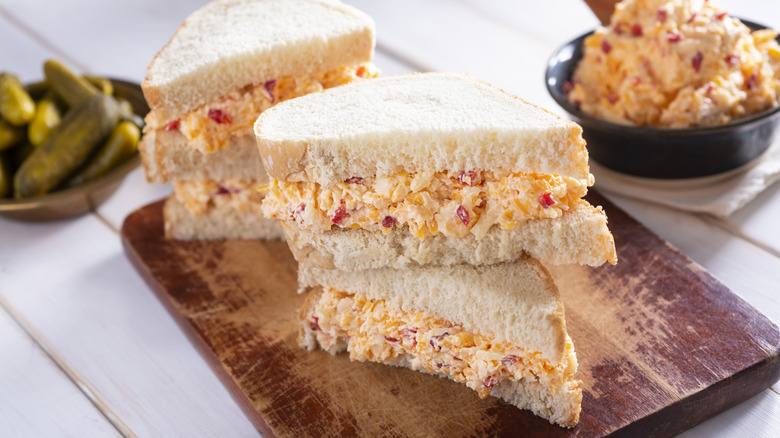 Pimento cheese sandwiches on cutting board
