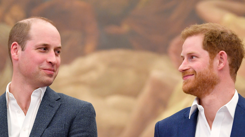 Princes William and Harry laugh together