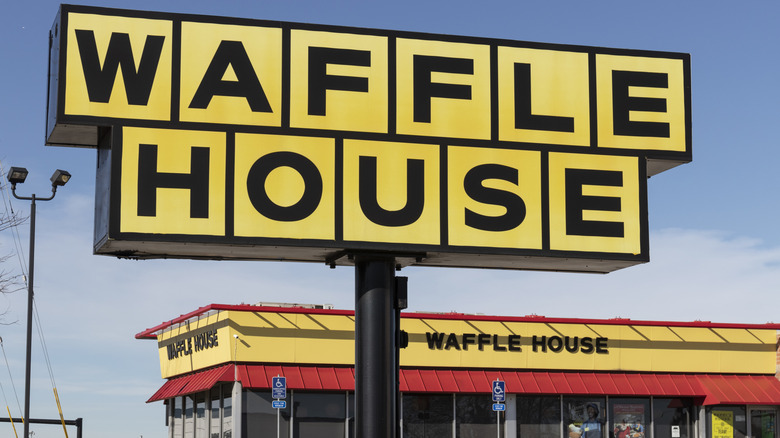 Waffle House sign in front of Waffle House restaurant
