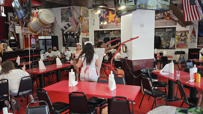 Person getting spanked at Heart Attack Grill