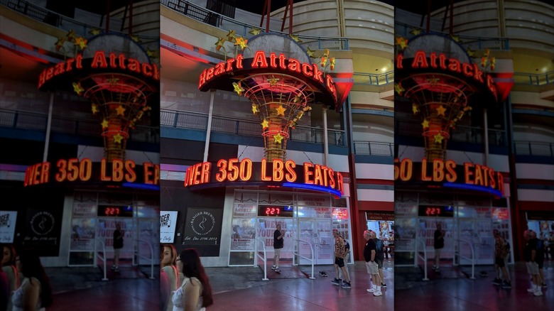 Man being weighed outside Heart Attack Grill