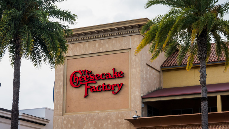The Cheesecake Factory sign in front of the restaurant.