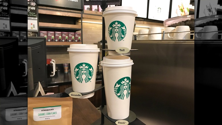 Display of different Starbucks cup sizes
