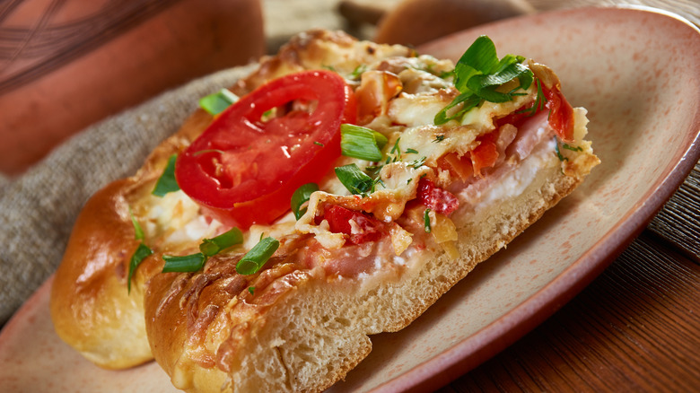 Russian pirog with vegetable toppings