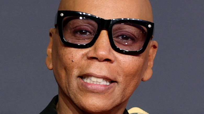 RuPaul wears tinted glasses