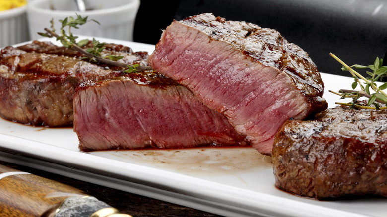 cut steak on plate