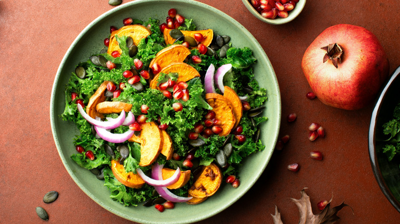 Bowl of kale and roasted sweet potato salad