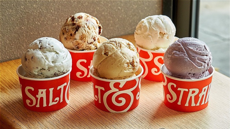 Assorted Salt & Straw scoops in red cups