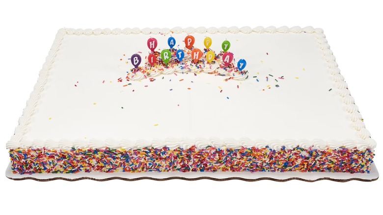 Full sized birthday sheet cake decorated with rainbow sprinkles