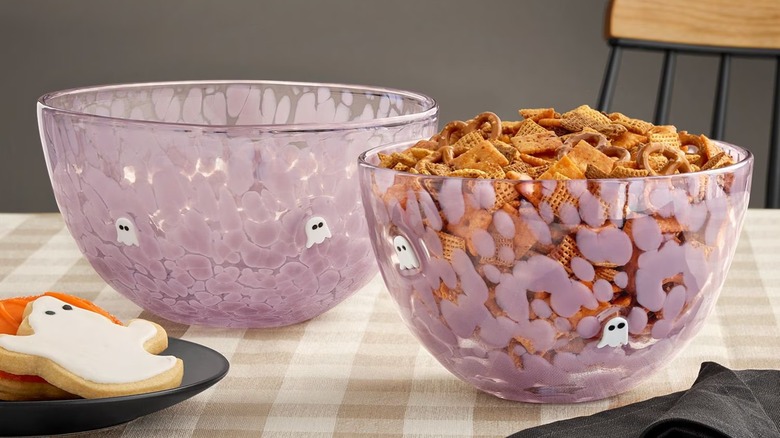 Two differently sized Halloween-themed serving bowls with ghost designs.