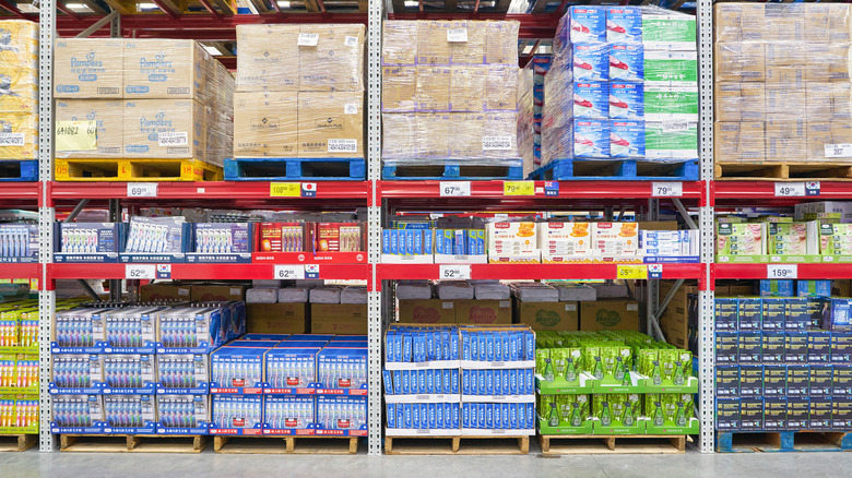 Bulk palettes stacked on shelves at Sam's Club.