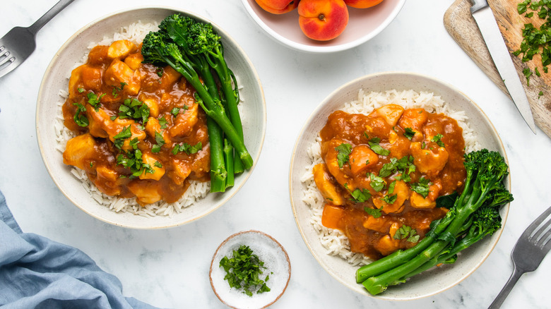 apricot chicken on two plates