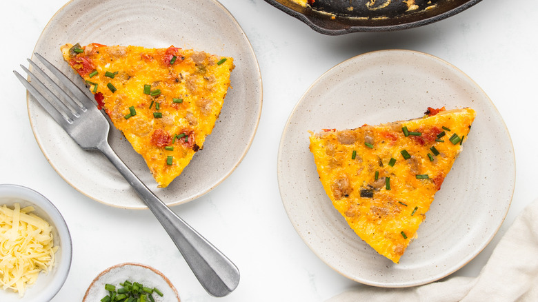 two slices of frittata on plates