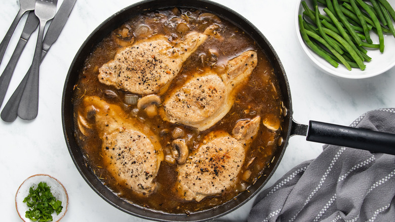 pork and gravy in  pan