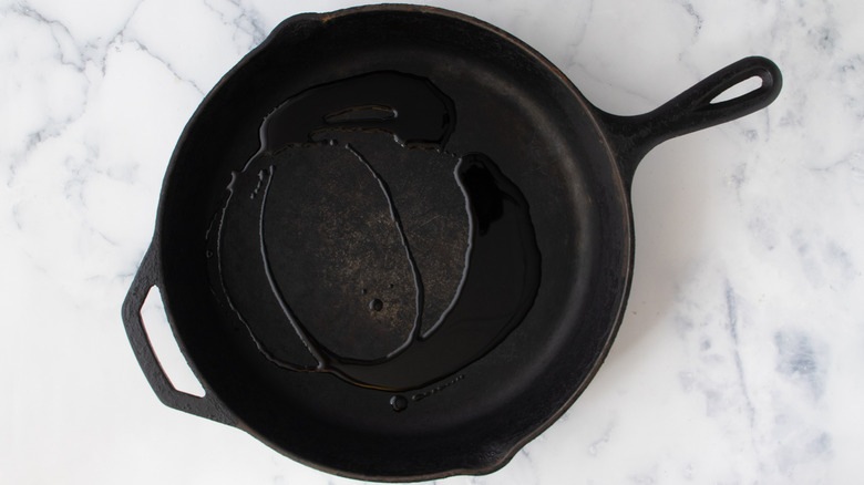 oil heating in cast iron skillet