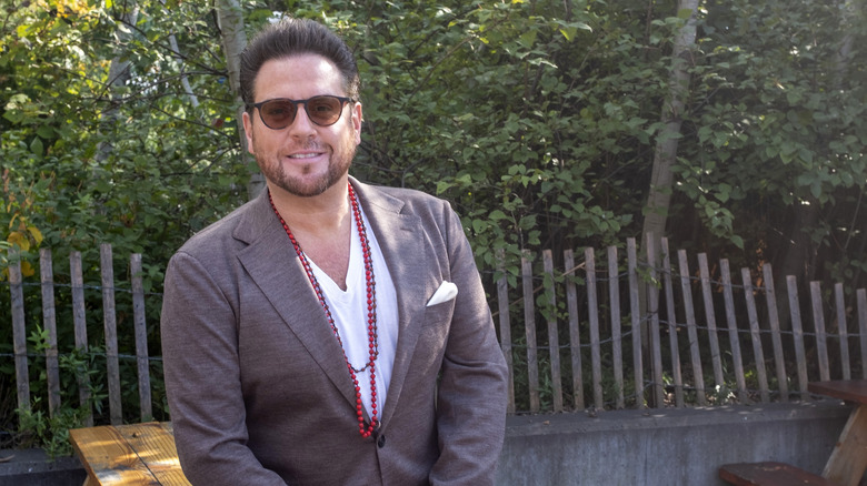 Scott Conant posing for a photo