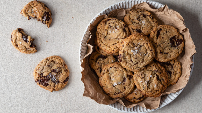 Bowl of chocolate chip cookies with salt