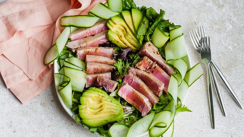 tuna salad plate with avocado and cucumber ribbons