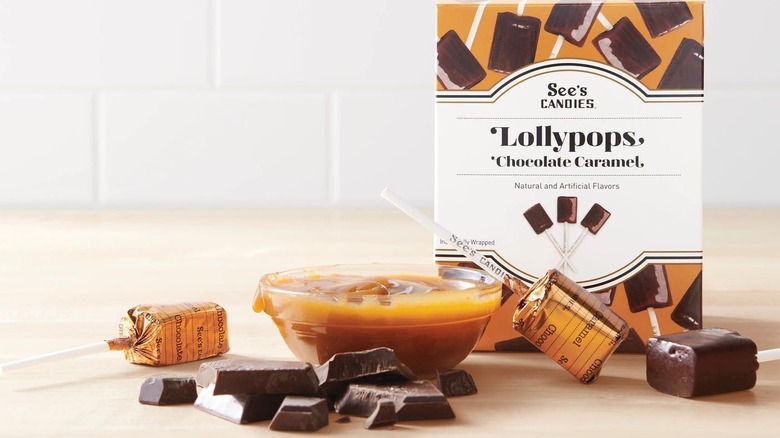 lollipops in front of box