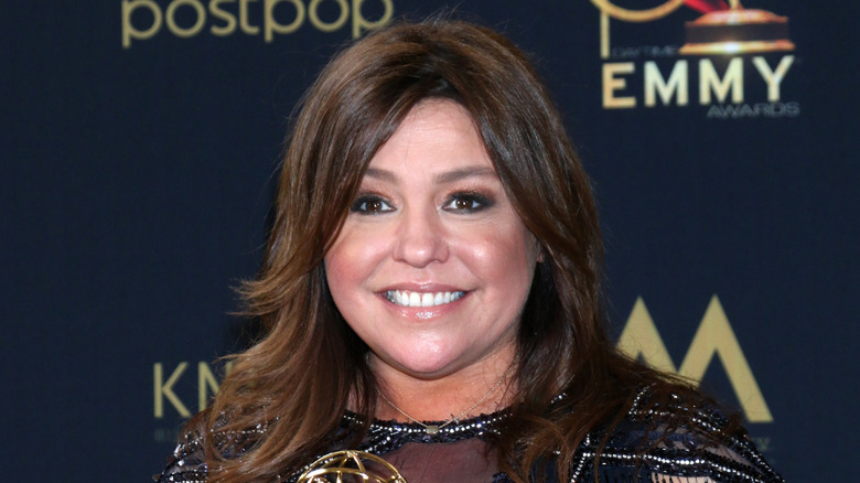 Rachael Ray holds her Emmy trophy at the 46th Emmy Awards