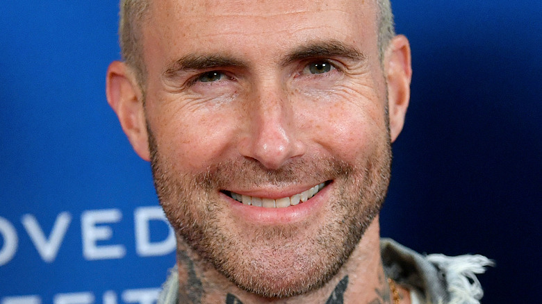 Adam Levine smiling