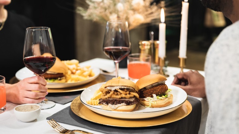 plated Shake Shack food with wine