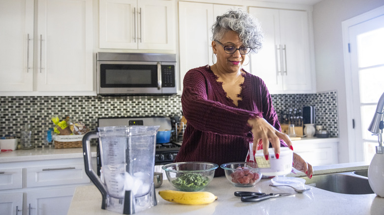 woman cooking in kitchen