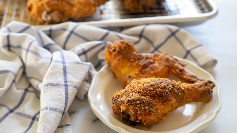 fried chicken drumsticks on plate