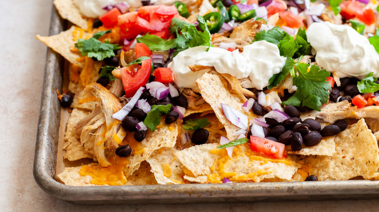 colorful nachos in sheet pan