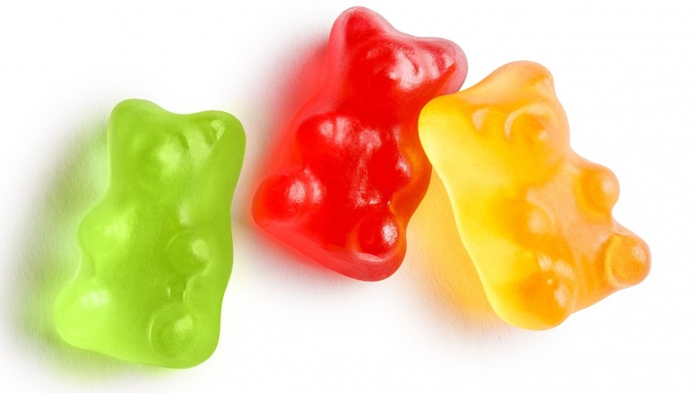 Green, red, and orange gummy bears