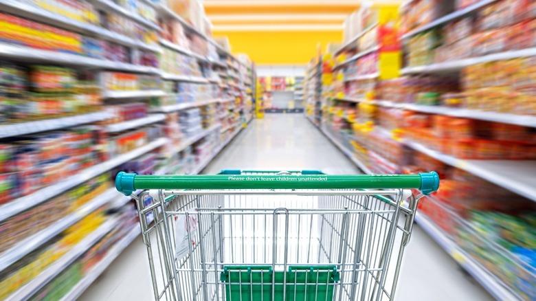 Shopping cart with green handles