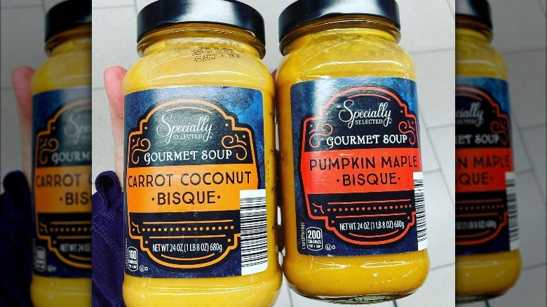 jar of coconut carrot bisque and jar of pumpkin maple bisque