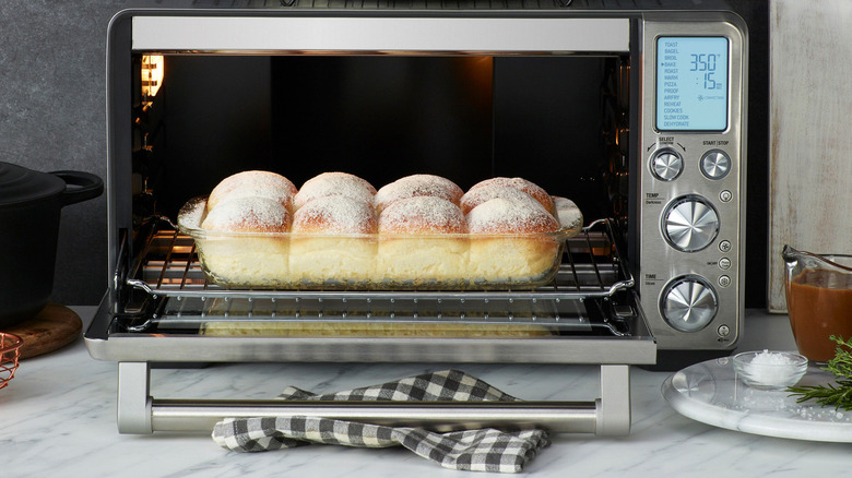 A new Breville Smart Oven Air Fryer with rolls inside