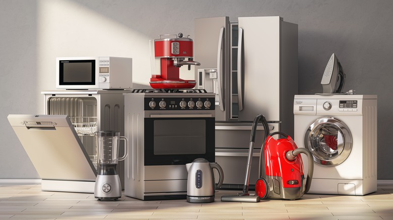 Assorted kitchen appliances in grey room