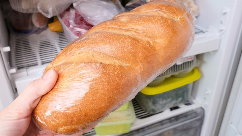 Person holding bread